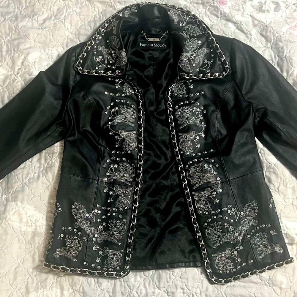 Pamela McCoy leather jacket with silver chains